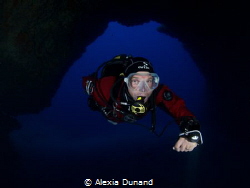 Diver in the Cathedral, Cavern on Lanzarote. by Alexia Dunand 